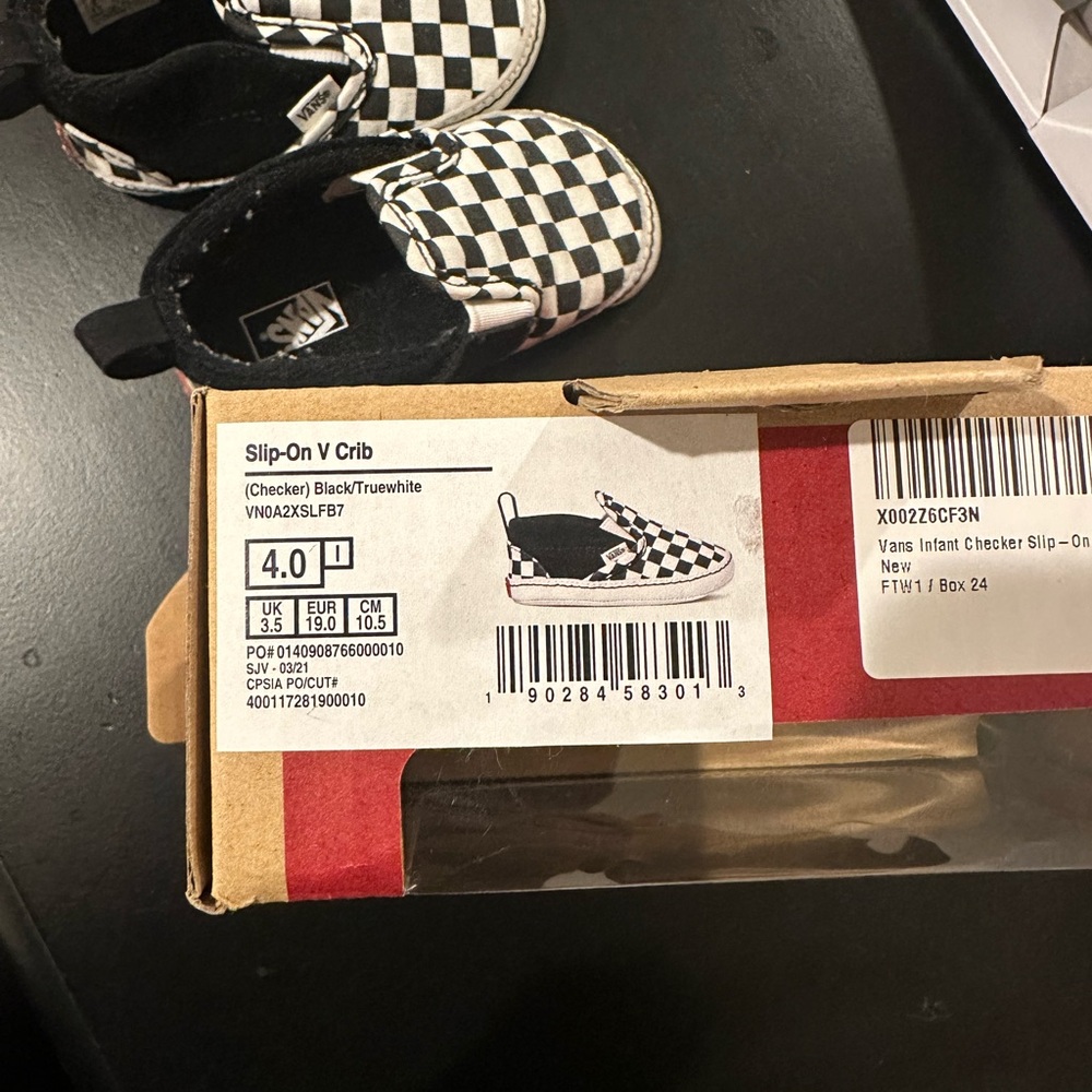 Vans Kids Black and White Checkerboard Slip-On Sneakers